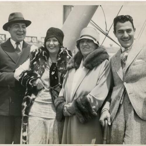 Norma Talmadge, Margaret Talmadge (center), James Cooley (left), and Gilbert Roland (right)
