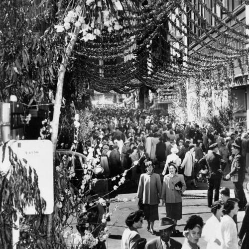 [Crowds of people attending the "Spring Comes to Maiden Lane" festival]