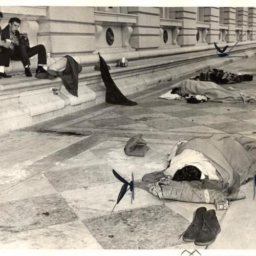 [Anti-nuclear demonstrators sleeping outside the Post Office]