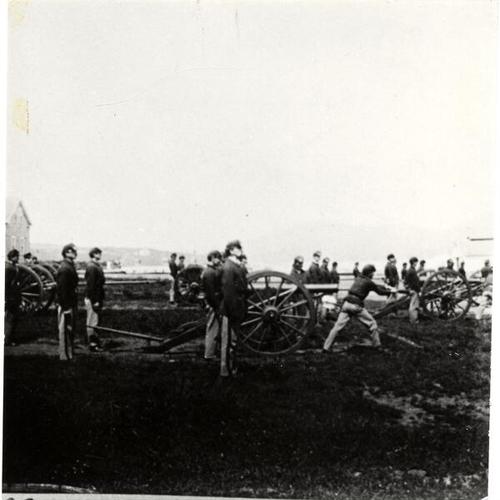 [Soldiers firing cannons at the Presidio]