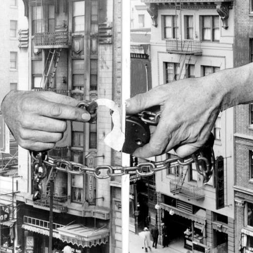 [Composite photo depicting King Hotel and St. Daniel Hotel being locked up by giant hands]