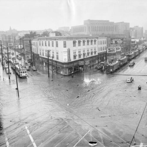 [Flood waters at the corner of Market Street at 14th]
