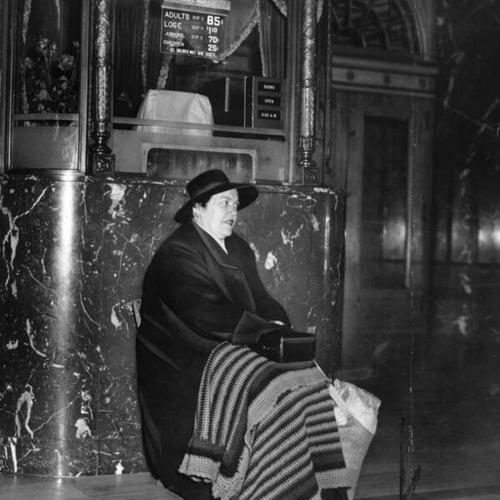 [Marion McDonald waiting for the box office of the Warfield Theatre to open for showing of "Gone With The Wind"]