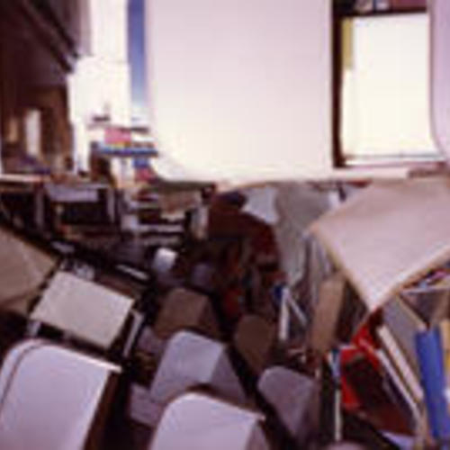 [Fallen books and shelves at Main Library after 1989 Earthquake]
