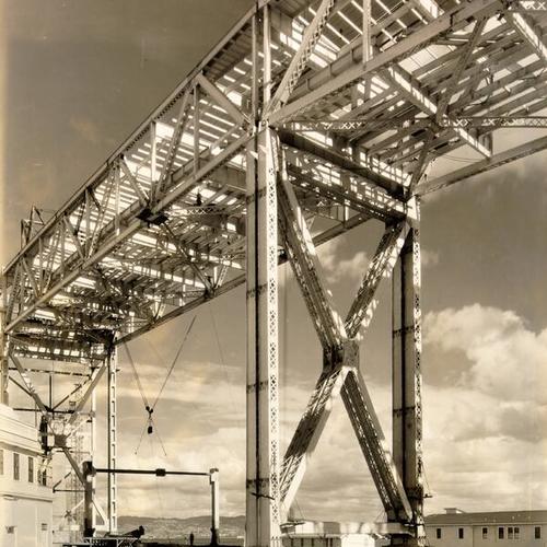 [View from below of split tower for San Francisco-Oakland Bay Bridge during construction]
