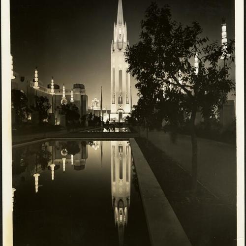 [Night view of the Court of Reflections where a tower is reflected in the water, Golden Gate International Exposition on Treasure Island]
