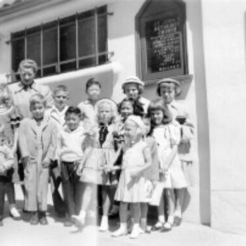 [Children from Sunday School class standing outside of St. John's Methodist Church]