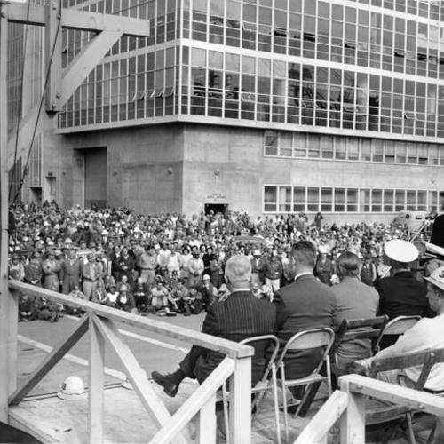 [Rear Admiral Lynde D. McCormick addressing an audience of workers at Hunters Point Naval Shipyard]