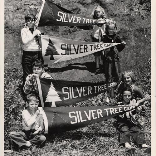 [Children holding flags of Silver Tree Camp at Glen Park]