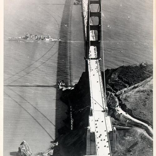 [Aerial view of the Golden Gate Bridge from the Marin County side, showing an unidentified ship entering San Francisco Bay]