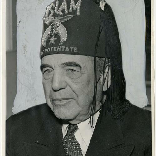 William L. Hughson in Shriner's potentate hat