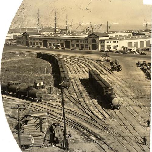 [View of freight cars and piers]