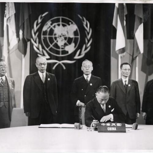[Delegates from China signing charter at United Nations Conference, 1945]