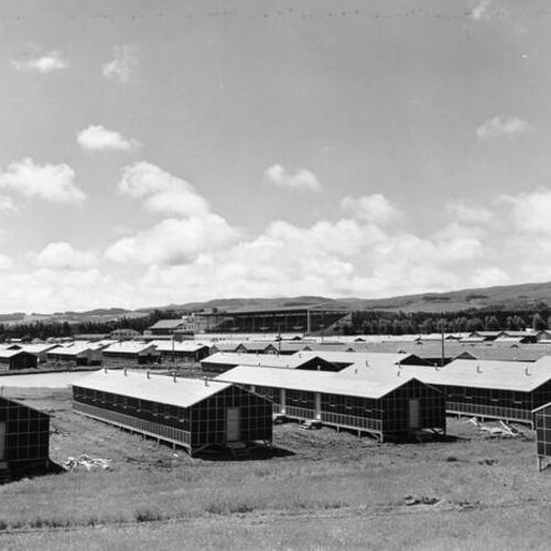 [Japanese assembly center and living quarters at the Tanforan race track]