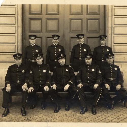 [Officer Martin A. Fogarty, sitted center front]