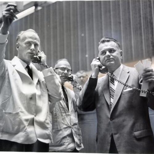 [Harry F. Flachs and Joseph A. Johnson at the San Francisco Stock Exchange]