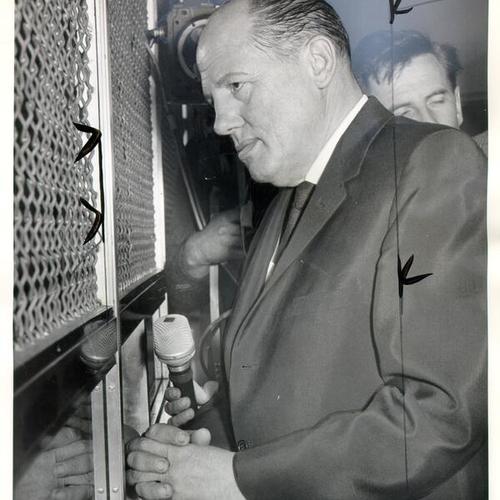 [City Assessor Russell L. Wolden checking in at City Prison after being booked on bribery and conspiracy charges]