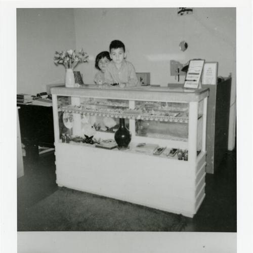 [Anna and Joseph at their father's store on Taraval Street]