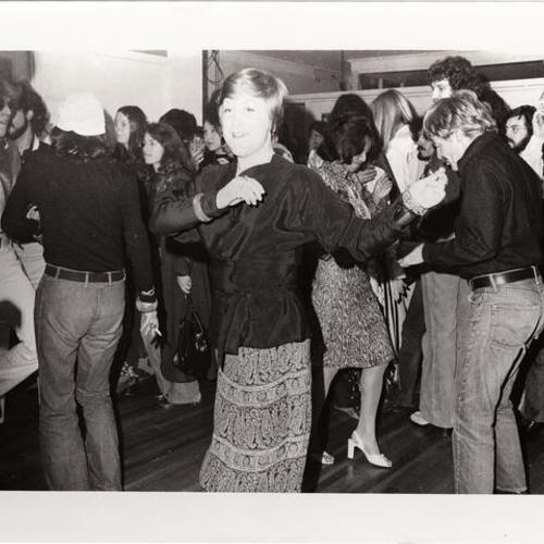 [Gallery opening party - people dancing]