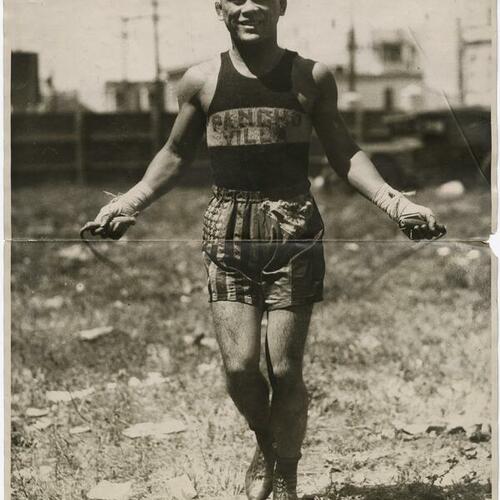 Filipino boxer Pancho Villa jumping rope outdoors