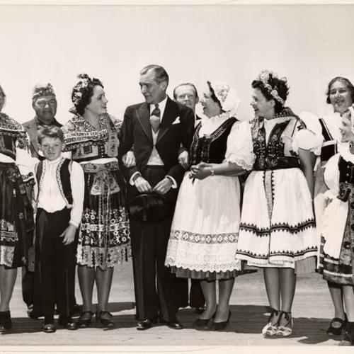 [Colonel Vladimir Hurban, Czechoslovakian minister to the United States, is welcomed by a group of Czech-Americans, Golden Gate International Exposition on Treasure Island]