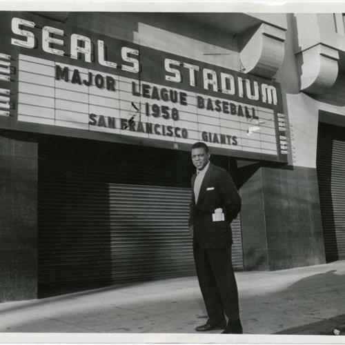 [Willie Mays standing in front of Seals Stadium]