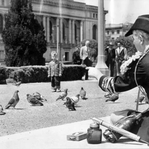 [Captain Ahab Muller searching Civic Center Plaza for the father of the pigeons hatched in Superior Judge Preston Devine's office in City Hall]