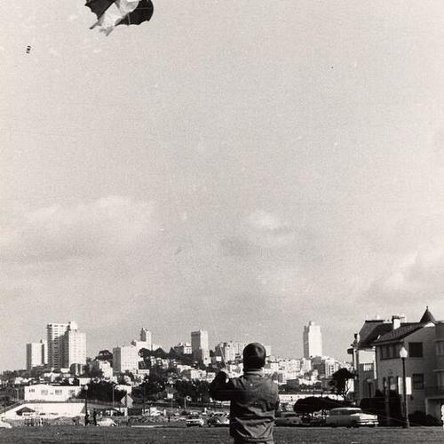[Child flying kite on Marina Green]