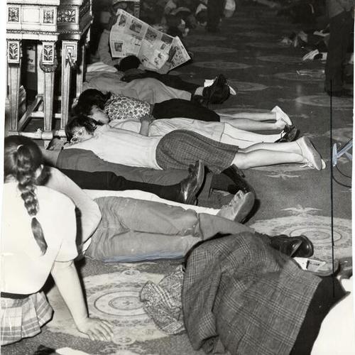 [Demonstrators during a 'sleep-in' in the lobby of the Sheraton Palace Hotel]