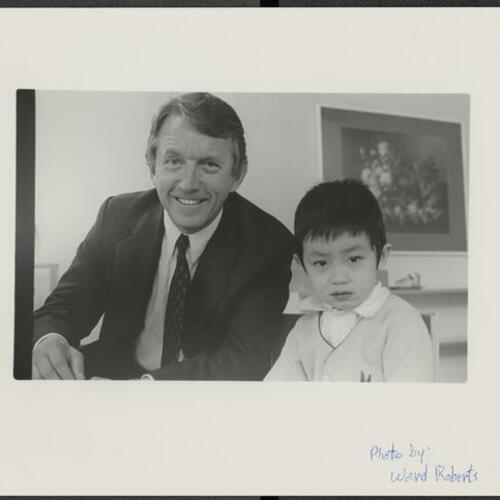Portrait of Leo McCarthy with child