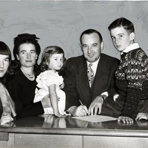 [Edmund G. Brown posing with his family as he files his declaration of candidacy for re-election]