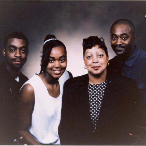 [Family portrait of Dominique, Paris, Kim and Dwight]
