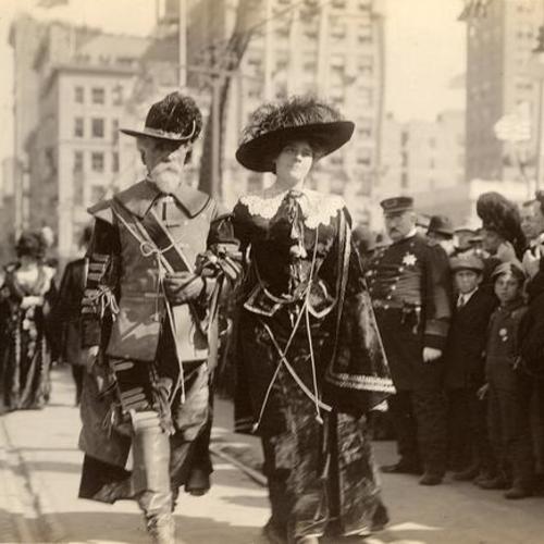 [Queen Virgilia and Don Gaspar de Portola on foot, Parade from Portola Festival, October 19-23,  1909]