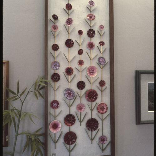 Framed flower art on display