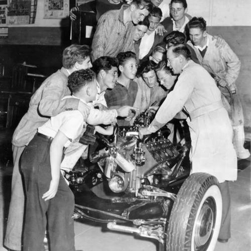 [Students in auto shop class at George Washington High School]
