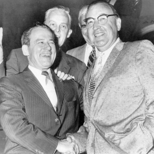 [Edmund G. (Pat) Brown (right) is greeted by Rep. Clair Engle (D-Calif.) upon arriving in Washington]