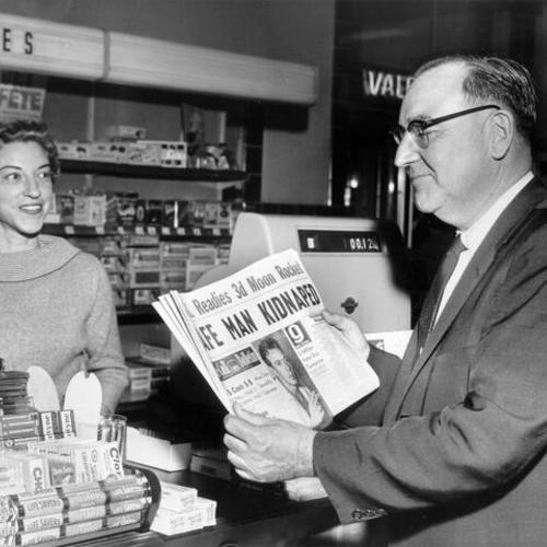 [Olga Mattison sells a Call Bulletin to Pat Brown as he arrives in SF airport at conclusion of his campaign]