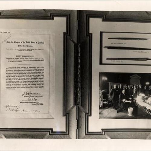 [Frame displaying Joint Resolution, pens used to sign joint resolution, and photo of President Taft signing Joint Resolution]