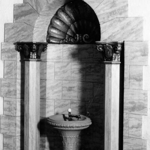  water fountain in an alcove of the El Capitan theater]