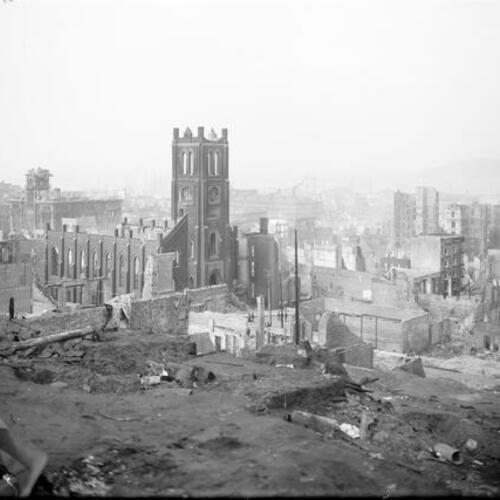 [Ruins after 1906 earthquake, Old St. Mary's Church at center, view looking northeast from above Dupont Street]