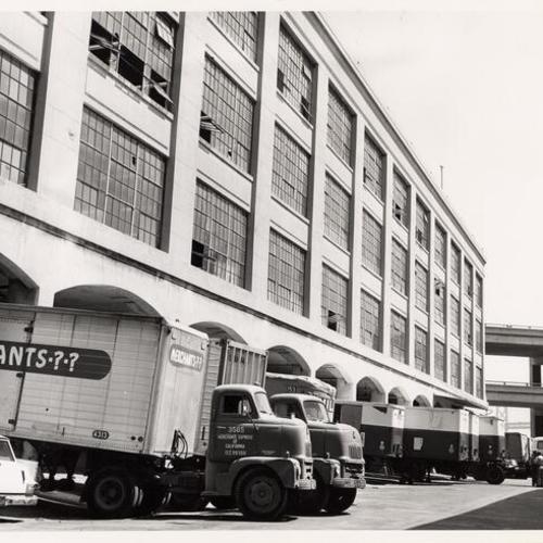 [Trucks parked in the mail center of the Ferry station Post office at Commercial street and Embarcadero]