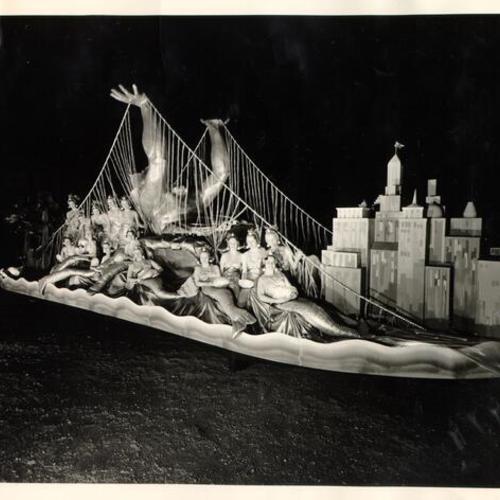 [Golden Gate Bridge Fiesta Parade float featuring women dressed up as mermaids surrounding a sculpture of Neptune]