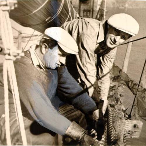 [Albert Martin and Hans Wessel, two bridge workers who almost fell while doing cable work on the San Francisco-Oakland Bay Bridge]