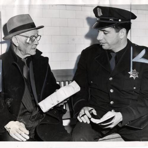 [Officer Joseph McCormick with John Treanor]