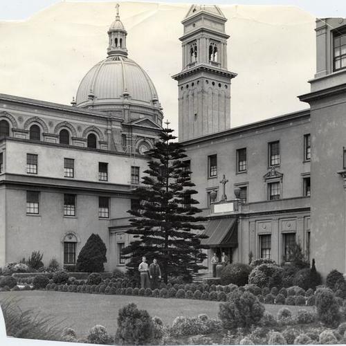 [View of the University of San Francisco campus showing campanile, church dome and faculty house]