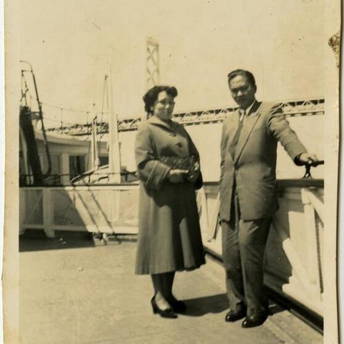 [Rosie and a relative on a San Francisco Bay ferry near the Bay Bridge]