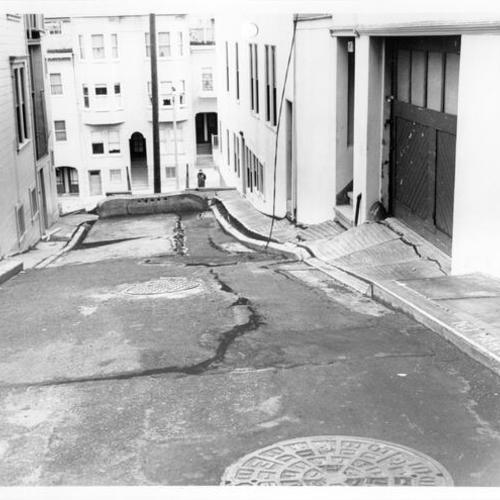 [Cracked pavement near Grant and Lombard streets on Telegraph Hill]