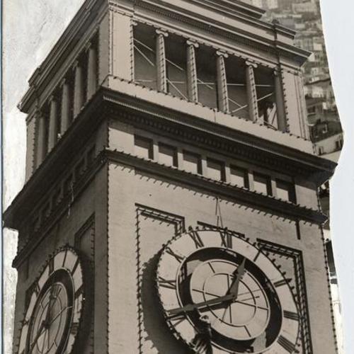 [Maintenance worker on face of Ferry Building clock]
