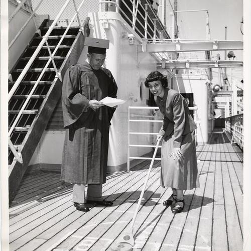[Professor Harold Baldwin and student Ruby Morehouse posing during the Second Annual San Francisco State College-American President Lines Summer Adventure Cruise]