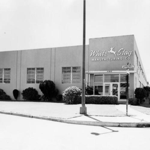[White Stag Manufacturing Co. on the corner of Apparel Way]